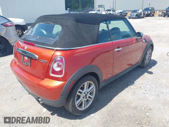 ✅ 2011 MINI Convertible • VIN: WMWZN3C59BTZ78139 • Lot: 42656318. Listed on IAAI with 73,138 mi. Free auction sales archive from the USA and detailed vehicle history report at DreamBid. Image 4.