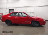 ✅ 2003 Kia Spectra GS • VIN: KNAFB161035115874 • Lot: 42179809. Wystawiony na IAAI z przebiegiem 127 594 mil. Bezpłatny archiwum sprzedaży aukcyjnych z USA i szczegółowy raport historii pojazdu na DreamBid. Zdjęcie 13.