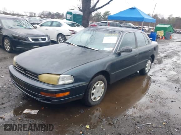 ✅ 1993 Toyota Camry DLX • VIN: 4T1SK11EXPU182114 • Лот: 41954624. Опубликован ранее на IAAI с пробегом 244 422 миль. Бесплатный доступ к архиву аукционных продаж из США и подробный отчёт об истории автомобиля на DreamBid. Изображение 2.