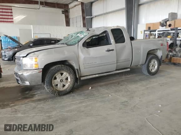 2013 Chevrolet Silverado 1500 LT с VIN 1GCRKSE74DZ262964, выставлен на аукционе Copart как лот 71714145 с пробегом 126 231 миль миль и Списание • Salvage title. История ставок и продаж доступна на DreamBid. Изображение 1.