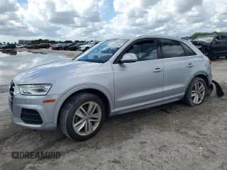 ✅ 2016 Audi Q3 Premium Plus • VIN: WA1BFCFSXGR013940 • Lot: 82232355. Wystawiony na Copart z przebiegiem 75 450 mil. Bezpłatny archiwum sprzedaży aukcyjnych z USA i szczegółowy raport historii pojazdu na DreamBid. Zdjęcie 1.