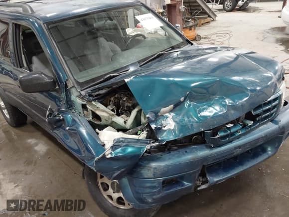 ✅ 1998 Isuzu Rodeo S • VIN: 4S2CK58W4W4337404 • Lot: 43075464. Listed on IAAI with 235,177 mi. Free auction sales archive from the USA and detailed vehicle history report at DreamBid. Image 6.