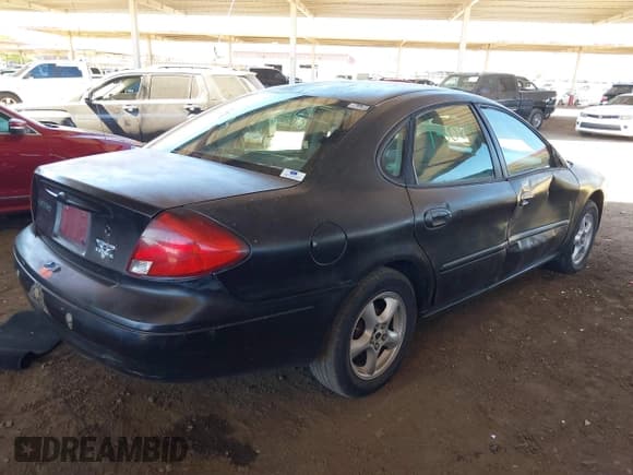 ✅ 2002 Ford Taurus SES Standard • VIN: 1FAFP55262G244684 • Lot: 42823919. Listed on IAAI with 164,232 mi. Free auction sales archive from the USA and detailed vehicle history report at DreamBid. Image 4.