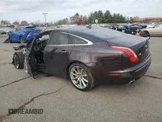 ✅ 2014 Jaguar XJ • VIN: SAJWJ1CD4E8V60190 • Lot: 90876975. Wystawiony na Copart z przebiegiem Nie podano. Bezpłatny archiwum sprzedaży aukcyjnych z USA i szczegółowy raport historii pojazdu na DreamBid. Zdjęcie 2.