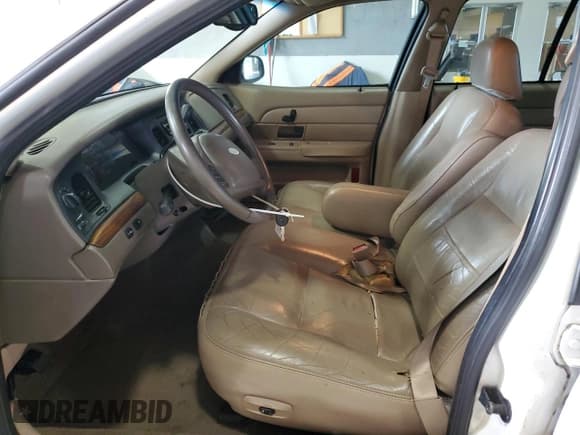 ✅ 2003 Ford Crown Victoria LX • VIN: 2FAFP74W23X134274 • Lot: 73295754. Listed on Copart with 212,581 mi. Free auction sales archive from the USA and detailed vehicle history report at DreamBid. Image 7.