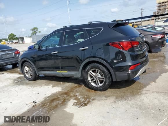 ✅ 2017 Hyundai Santa Fe 2.4L • VIN: 5NMZU3LBXHH016664 • Лот: 64079324. Опубликован ранее на Copart с пробегом 99 050 миль. Бесплатный доступ к архиву аукционных продаж из США и подробный отчёт об истории автомобиля на DreamBid. Изображение 2.