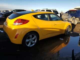 2015 Hyundai Veloster z VIN KMHTC6AD2FU226062, wystawiony jako Copart lot #42918224 z przebiegiem Nie podano mil oraz . Historia ofert i sprzedaży dostępna na DreamBid. Obrazek 3.