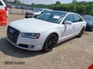 ✅ 2015 Audi A8 3.0T • VIN: WAU3GAFD6FN001784 • Lot: 42793231. Listed on IAAI with 84,021 mi. Free auction sales archive from the USA and detailed vehicle history report at DreamBid. Image 2.