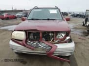 ✅ 2000 Suzuki Grand Vitara JLX • VIN: JS3TD62V9Y4112122 • Lot: 43838714. Listed on IAAI with Not provided. Free auction sales archive from the USA and detailed vehicle history report at DreamBid. Image 12.