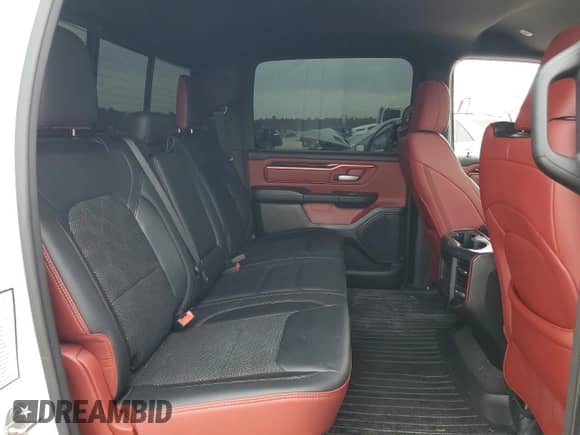 2020 Ram 1500 Rebel z VIN 1C6RRELT2LN303523, wystawiony jako Copart lot #54753485 z przebiegiem 90 533 mil mil oraz Szkoda całkowita • Salvage title. Historia ofert i sprzedaży dostępna na DreamBid. Obrazek 11.