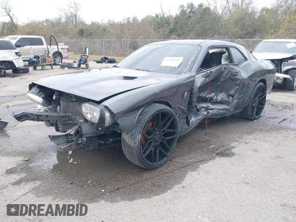 ✅ 2013 Dodge Challenger Rallye Redline • VIN: 2C3CDYAG0DH704233 • Lot: 41299191. Wystawiony na IAAI z przebiegiem 158 081 mil. Bezpłatny archiwum sprzedaży aukcyjnych z USA i szczegółowy raport historii pojazdu na DreamBid. Zdjęcie 2.