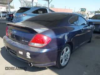 2005 Hyundai Tiburon GT с VIN KMHHN65F35U174645, выставлен на аукционе IAAI как лот 42655120 с пробегом 128 059 миль миль и . История ставок и продаж доступна на DreamBid. Изображение 4.