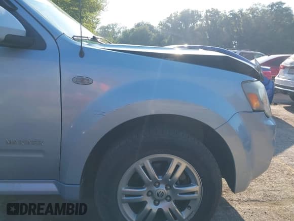 ✅ 2008 Mercury Mariner Premier • VIN: 4M2CU87128KJ15756 • Lot: 43119812. Wystawiony na IAAI z przebiegiem 160 318 mil. Bezpłatny archiwum sprzedaży aukcyjnych z USA i szczegółowy raport historii pojazdu na DreamBid. Zdjęcie 12.