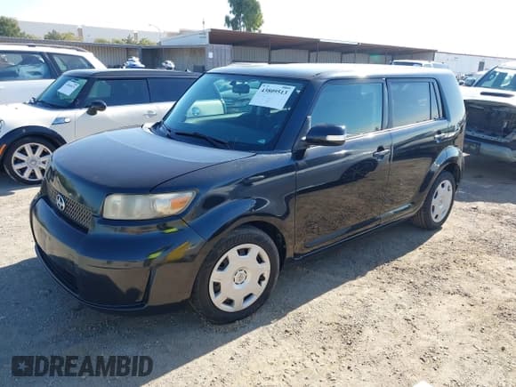 ✅ 2009 Scion xB • VIN: JTLKE50E591063366 • Lot: 43809513. Listed on IAAI with 165,587 mi. Free auction sales archive from the USA and detailed vehicle history report at DreamBid. Image 2.