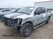 ✅ 2004 Nissan Titan XE • VIN: 1N6AA07A54N593067 • Lot: 41956764. Listed on IAAI with 256,100 mi. Free auction sales archive from the USA and detailed vehicle history report at DreamBid. Image 2.