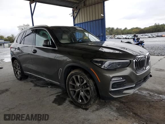 ✅ 2020 BMW X5 xDrive40i • VIN: 5UXCR6C06LLL75264 • Лот: 82707345. Опубликован ранее на Copart с пробегом Не указан. Бесплатный доступ к архиву аукционных продаж из США и подробный отчёт об истории автомобиля на DreamBid. Изображение 4.