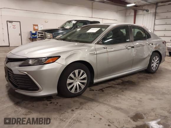 2021 Toyota Camry Hybrid LE with VIN 4T1C31AKXMU027792, listed as a IAAI auction lot 42012242 with 53,397 mi miles and . Bid and sale history available at DreamBid. Image 2.