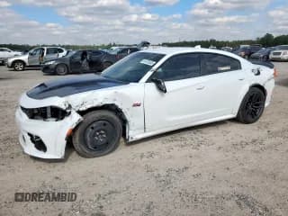 ✅ 2022 Dodge Charger Scat Pack • VIN: 2C3CDXGJ3NH105065 • Lot: 91475555. Listed on Copart with 18,236 mi. Free auction sales archive from the USA and detailed vehicle history report at DreamBid. Image 1.