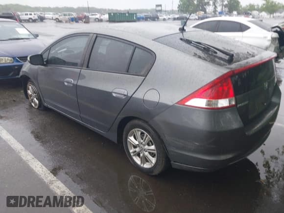 ✅ 2010 Honda Insight EX • VIN: JHMZE2H76AS010087 • Lot: 42324827. Listed on IAAI with 120,737 mi. Free auction sales archive from the USA and detailed vehicle history report at DreamBid. Image 3.