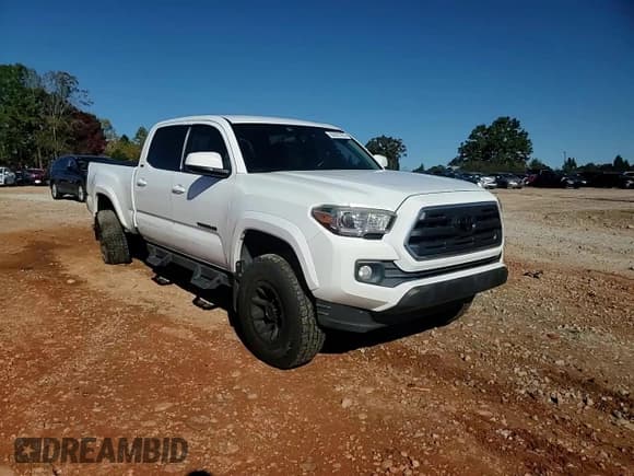 ✅ 2017 Toyota Tacoma SR5 • VIN: 5TFBZ5DN9HX001927 • Lot: 82623785. Listed on Copart with 130,642 mi. Free auction sales archive from the USA and detailed vehicle history report at DreamBid. Image 13.