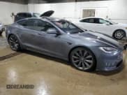 ✅ 2022 Tesla Model S Plaid • VIN: 5YJSA1E64NF460280 • Lot: 60063745. Listed on Copart with 42,387 mi. Free auction sales archive from the USA and detailed vehicle history report at DreamBid. Image 4.