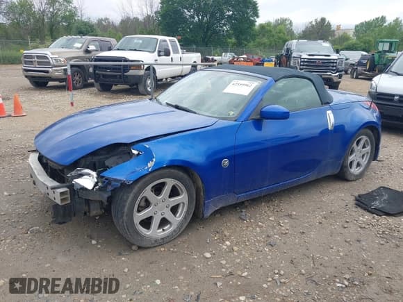 ✅ 2004 Nissan 350Z Touring • VIN: JN1AZ36A64M253739 • Lot: 42559962. Wystawiony na IAAI z przebiegiem 179 554 mil. Bezpłatny archiwum sprzedaży aukcyjnych z USA i szczegółowy raport historii pojazdu na DreamBid. Zdjęcie 2.