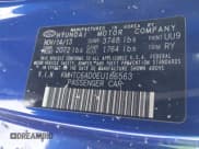 ✅ 2014 Hyundai Veloster • VIN: KMHTC6AD0EU186563 • Lot: 41572856. Wystawiony na IAAI z przebiegiem 156 227 mil. Bezpłatny archiwum sprzedaży aukcyjnych z USA i szczegółowy raport historii pojazdu na DreamBid. Zdjęcie 9.