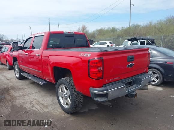✅ 2015 Chevrolet Silverado 2500HD LTZ • VIN: 1GC1KWE83FF616085 • Lot: 41987956. Listed on IAAI with 72,950 mi. Free auction sales archive from the USA and detailed vehicle history report at DreamBid. Image 3.