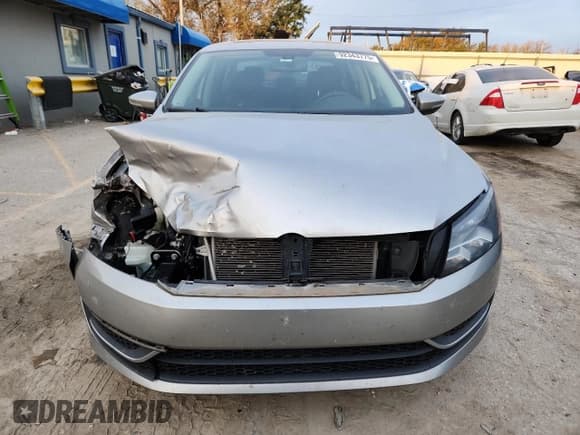 ✅ 2012 Volkswagen Passat SE • VIN: 1VWBH7A3XCC035793 • Lot: 92343775. Listed on Copart with 105,900 mi. Free auction sales archive from the USA and detailed vehicle history report at DreamBid. Image 5.