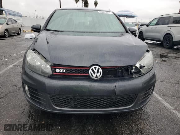 ✅ 2014 Volkswagen Golf GTI Wolfsburg Edition • VIN: WVWHD7AJ6EW002377 • Lot: 93031815. Wystawiony na Copart z przebiegiem 118 042 mil. Bezpłatny archiwum sprzedaży aukcyjnych z USA i szczegółowy raport historii pojazdu na DreamBid. Zdjęcie 5.