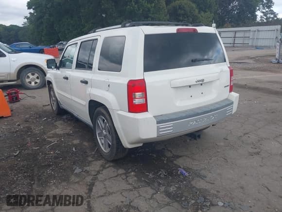 ✅ 2007 Jeep Patriot Limited • VIN: 1J8FT48W47D401631 • Lot: 43309240. Listed on IAAI with 148,523 mi. Free auction sales archive from the USA and detailed vehicle history report at DreamBid. Image 3.