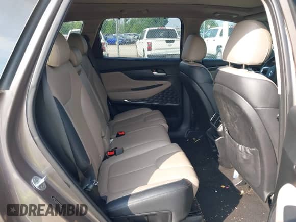 2019 Hyundai Santa Fe Ultimate z VIN 5NMS53AD8KH061810, wystawiony jako IAAI lot #42481330 z przebiegiem 96 030 mil mil oraz . Historia ofert i sprzedaży dostępna na DreamBid. Obrazek 8.