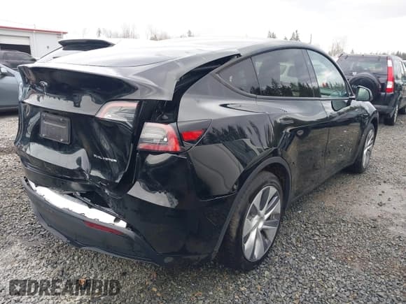 ✅ 2023 Tesla Model Y Long Range • VIN: 7SAYGAEE2PF905136 • Lot: 41572597. Listed on IAAI with 33,425 mi. Free auction sales archive from the USA and detailed vehicle history report at DreamBid. Image 4.