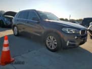 ✅ 2015 BMW X5 sDrive35i • VIN: 5UXKR2C54F0H38329 • Lot: 84153055. Listed on Copart with 167,641 mi. Free auction sales archive from the USA and detailed vehicle history report at DreamBid. Image 4.