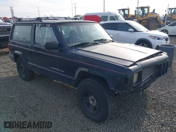 ✅ 1999 Jeep Cherokee Sport • VIN: 1J4FF67S3XL542845 • Lot: 43576296. Listed on IAAI with 248,139 mi. Free auction sales archive from the USA and detailed vehicle history report at DreamBid. Image 1.