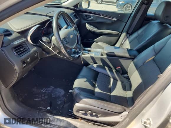 2017 Chevrolet Impala LT with VIN 1G1105SA4HU143554, listed as a Copart auction lot 86677125 with 198,009 mi miles and Salvage title. Bid and sale history available at DreamBid. Image 7.