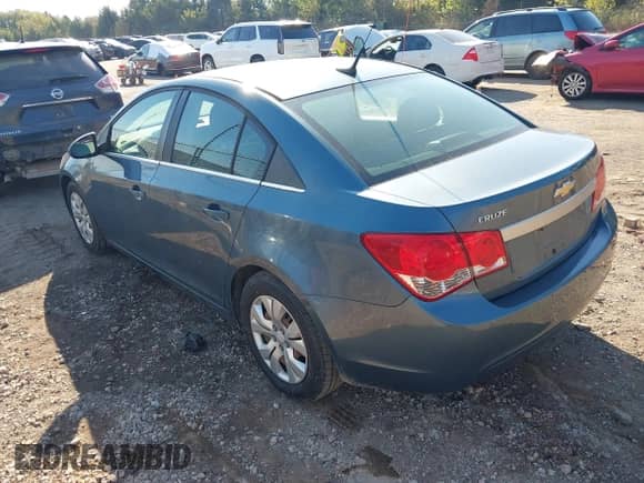 2012 Chevrolet Cruze LS z VIN 1G1PC5SH4C7299339, wystawiony jako IAAI lot #43442779 z przebiegiem 197 467 mil mil oraz . Historia ofert i sprzedaży dostępna na DreamBid. Obrazek 3.