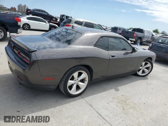 ✅ 2016 Dodge Challenger R/T • VIN: 2C3CDZBT6GH143266 • Lot: 48716644. Wystawiony na Copart z przebiegiem 171 014 mil. Bezpłatny archiwum sprzedaży aukcyjnych z USA i szczegółowy raport historii pojazdu na DreamBid. Zdjęcie 3.