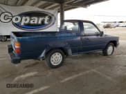 ✅ 1990 Toyota Pickup • VIN: JT4RN81A8L5087605 • Lot: 68218155. Listed on Copart with 158,031 mi. Free auction sales archive from the USA and detailed vehicle history report at DreamBid. Image 3.