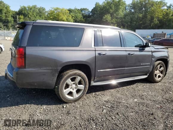 2017 Chevrolet Suburban Premier z VIN 1GNSKJKC2HR129663, wystawiony jako Copart lot #68574504 z przebiegiem 152 922 mil mil oraz Szkoda całkowita • Salvage title. Historia ofert i sprzedaży dostępna na DreamBid. Obrazek 3.