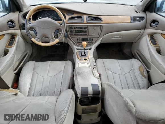 ✅ 2002 Jaguar S-Type • VIN: SAJDA01P82GM32860 • Лот: 70599545. Опубликован ранее на Copart с пробегом 131 894 миль. Бесплатный доступ к архиву аукционных продаж из США и подробный отчёт об истории автомобиля на DreamBid. Изображение 8.