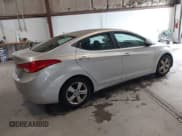 ✅ 2012 Hyundai Elantra Limited • VIN: KMHDH4AE0CU208013 • Lot: 42423916. Listed on IAAI with 205,324 mi. Free auction sales archive from the USA and detailed vehicle history report at DreamBid. Image 4.