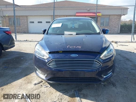 ✅ 2016 Ford Focus Titanium • VIN: 1FADP3N21GL405372 • Lot: 43574471. Listed on IAAI with 126,000 mi. Free auction sales archive from the USA and detailed vehicle history report at DreamBid. Image 12.
