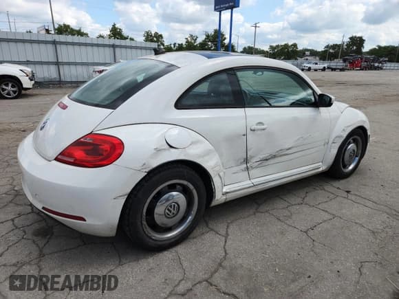 ✅ 2013 Volkswagen Beetle 2.5L • VIN: 3VWHX7AT6DM603406 • Lot: 69780225. Listed on Copart with 176,174 mi. Free auction sales archive from the USA and detailed vehicle history report at DreamBid. Image 3.