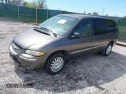 ✅ 1999 Chrysler Town & Country LX • VIN: 1C4GP54LXXB553393 • Lot: 41968605. Listed on IAAI with 256,400 mi. Free auction sales archive from the USA and detailed vehicle history report at DreamBid. Image 2.