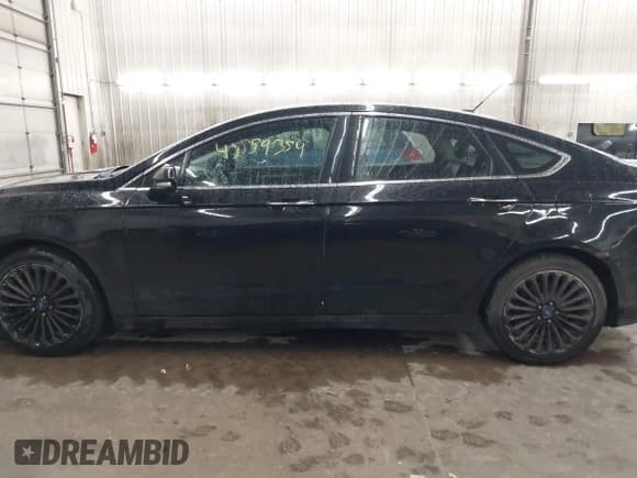 ✅ 2016 Ford Fusion Titanium • VIN: 3FA6P0K94GR158892 • Lot: 43559354. Listed on IAAI with 206,905 mi. Free auction sales archive from the USA and detailed vehicle history report at DreamBid. Image 15.
