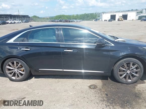 ✅ 2014 Cadillac XTS Livery • VIN: 2G61U5S34E9287341 • Лот: 42786123. Опубликован ранее на IAAI с пробегом 180 022 миль. Бесплатный доступ к архиву аукционных продаж из США и подробный отчёт об истории автомобиля на DreamBid. Изображение 13.