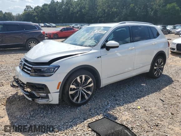 ✅ 2021 Volkswagen Tiguan SEL Premium R-Line • VIN: 3VV4B7AX9MM159586 • Лот: 80168335. Опубликован ранее на Copart с пробегом 79 198 миль. Бесплатный доступ к архиву аукционных продаж из США и подробный отчёт об истории автомобиля на DreamBid. Изображение 1.