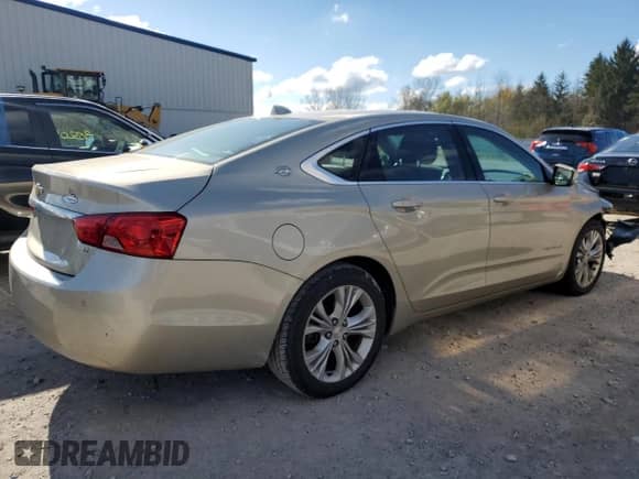 2014 Chevrolet Impala LT with VIN 2G1125S32E9300650, listed as a Copart auction lot 90485325 with 166,657 mi miles and Salvage title. Bid and sale history available at DreamBid. Image 3.