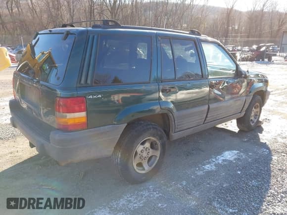 ✅ 1998 Jeep Grand Cherokee Laredo • VIN: 1J4GZ58S8WC124199 • Lot: 41853943. Listed on IAAI with Not provided. Free auction sales archive from the USA and detailed vehicle history report at DreamBid. Image 4.